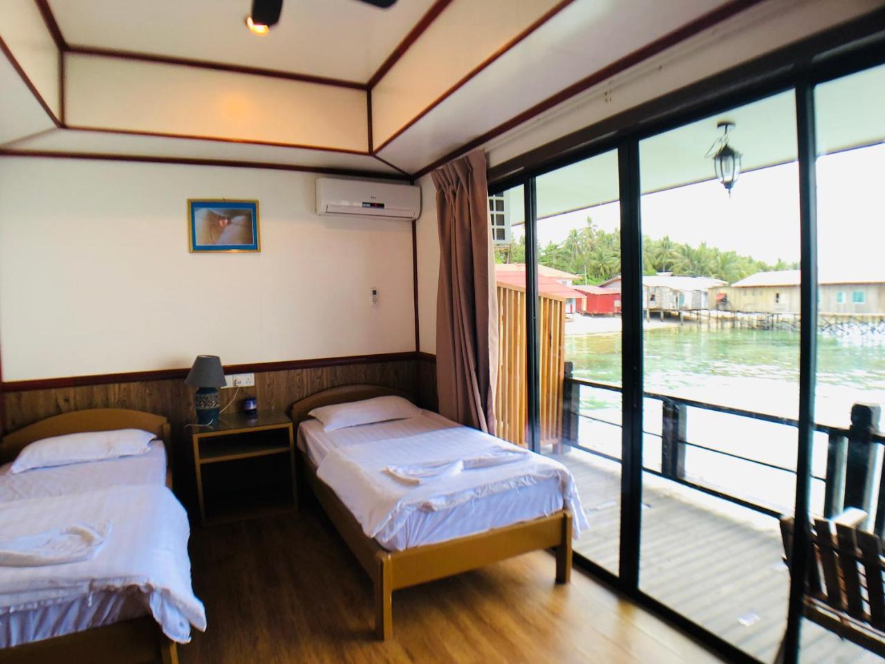 Mabul Paradise Lodge Mabul Island Buitenkant foto